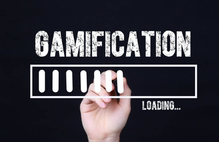 une main qui écrit gamification